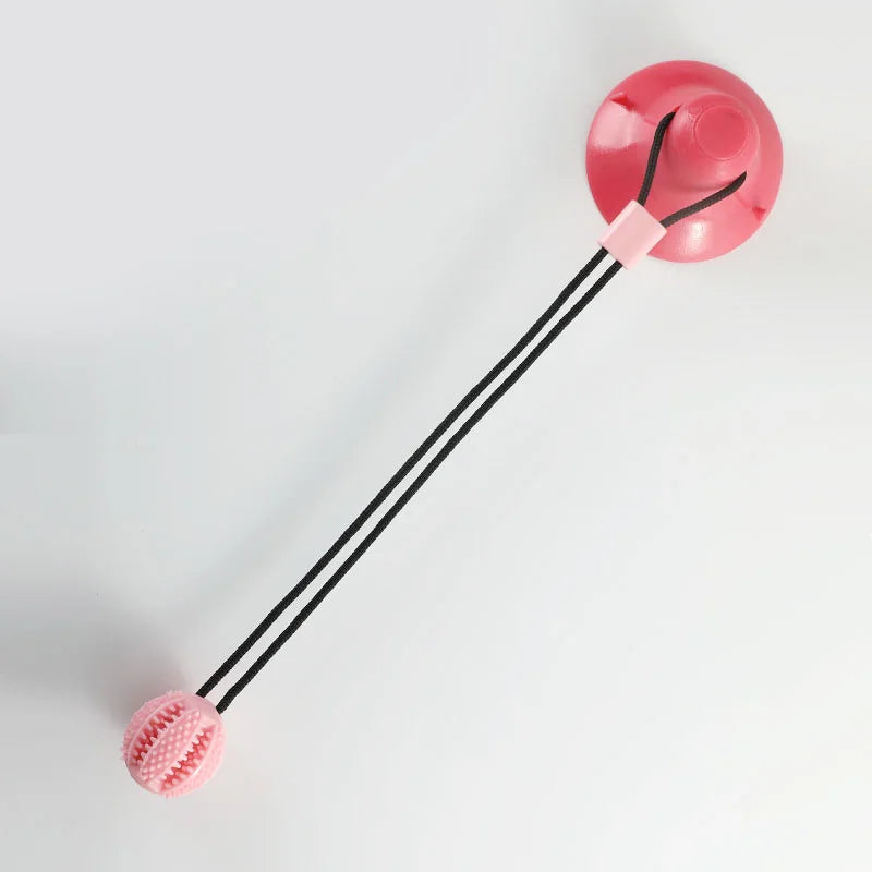 “Juguete interactivo para perros con ventosa, sonido y dispensador de premios – Pelota de caucho resistente para entrenar y jugar al tira y afloja.”